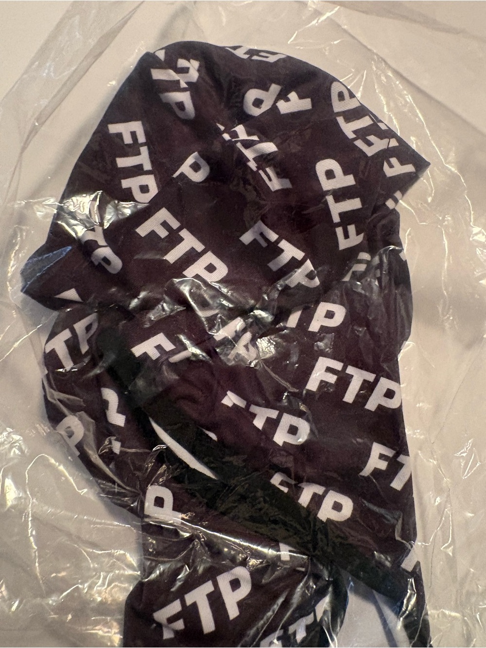 FTP Black Hoodie with Repeated White Logo Print